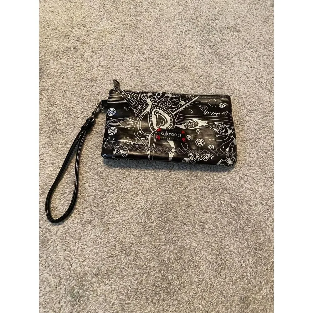 Sak roots wristlet wallet rechargeable battery inside